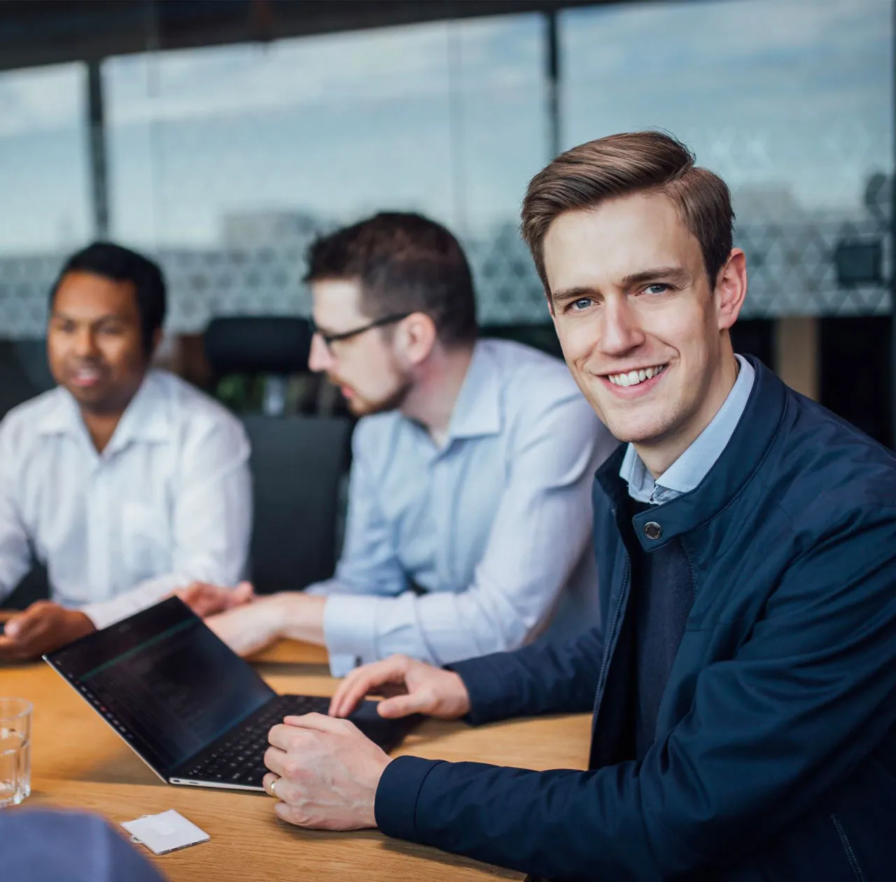 A member of the Fjelltopp team looking ready to receive your query